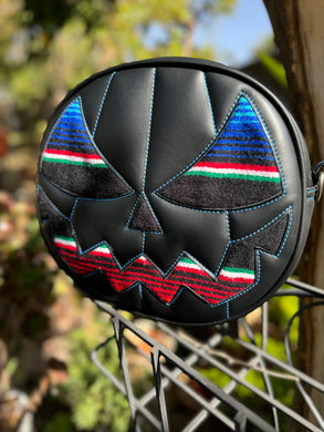 Hand Crafted; Mean Face Black with blue, red, green, and white Serape Print Blanket