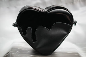 All black heart handbag with patent black goo. Photo of the back. 