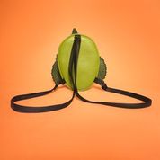 Load image into Gallery viewer, swamp monster backpack back on orange background